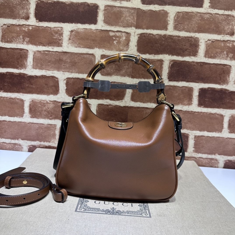 G*u*i top handle bags